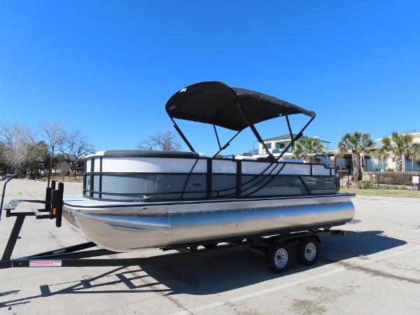 South Bay 222 FCR 2025 South Bay 222 FCR pontoon boat on trailer, sunny day.