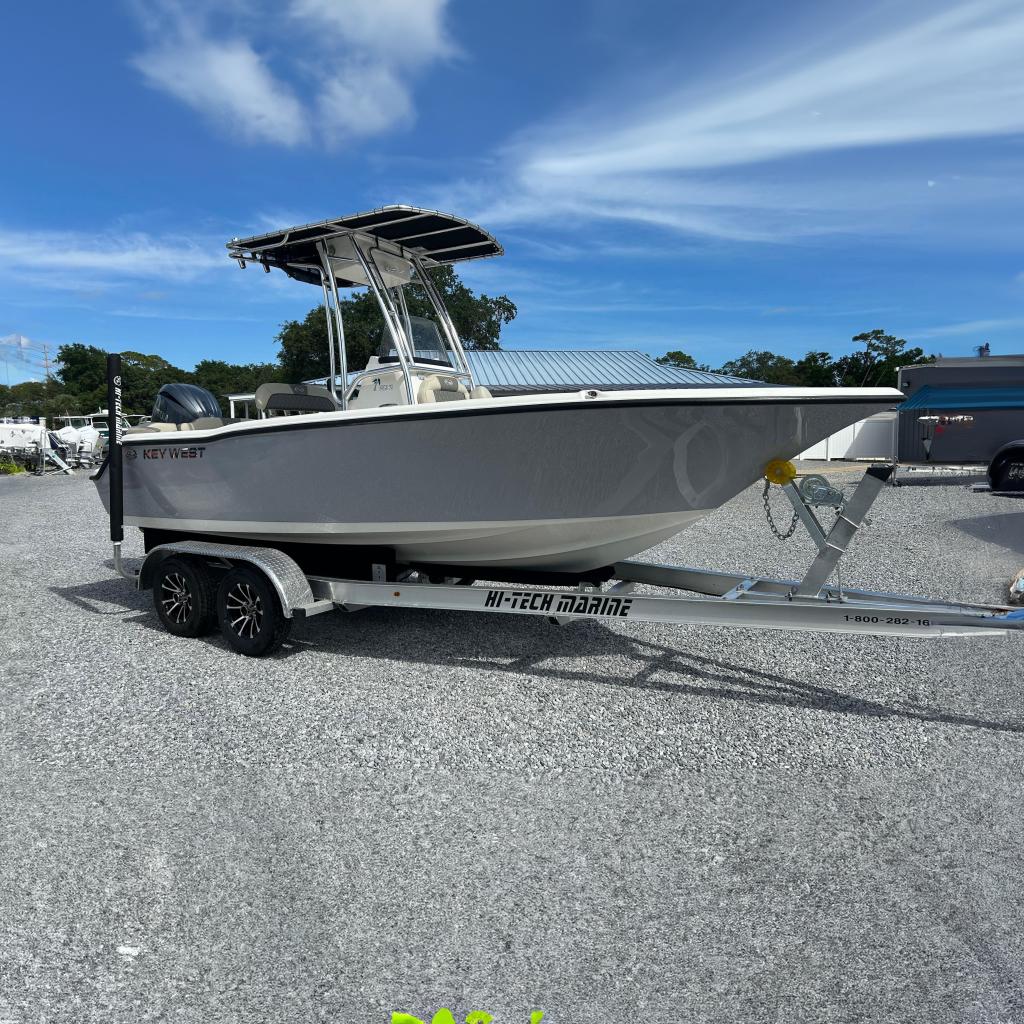 Key West 203 FS 2026 Key West 203 FS boat on trailer under clear blue sky.