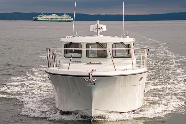 Lindell 38 Lindell 38 boat cruising on water, 2025 model.