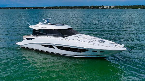 Sea Ray 470 Sundancer 2016 Sea Ray 470 Sundancer yacht on calm water, showcasing sleek design and luxury features.