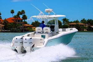 Stamas 317 Tarpon 2016 Stamas 317 Tarpon boat cruising on water with twin Yamaha engines.