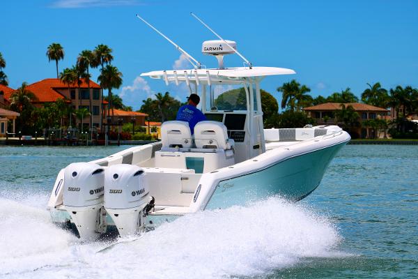 Stamas 317 Tarpon 2016 Stamas 317 Tarpon boat cruising on water with twin Yamaha engines.