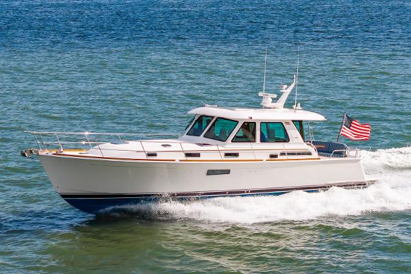 Sabre Salon Express 2025 Sabre 48 Salon Express yacht cruising on open water.