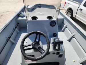 SeaArk 1872 MVT 2025 SeaArk 1872 MVT boat interior with steering wheel and control panel.
