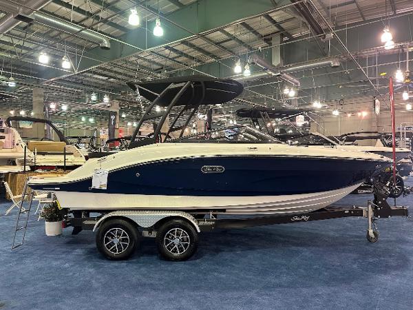 Sea Ray SPX 190 2025 Sea Ray SPX 190 boat displayed indoors on a trailer.