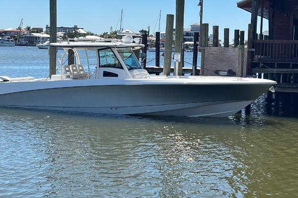 Boston Whaler 370 Outrage 2014 Boston Whaler 370 Outrage boat docked in a marina.