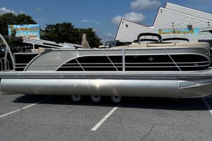 Berkshire 23CL STS 3.0 2025 Berkshire 23CL STS 3.0 pontoon boat parked outdoors on a sunny day.