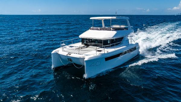 Leopard 40 Powercat 2025 Leopard 40 Powercat cruising on open ocean under clear blue sky.