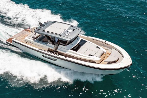 Bluegame BG62 2019 Bluegame BG62 luxury yacht cruising on the ocean.