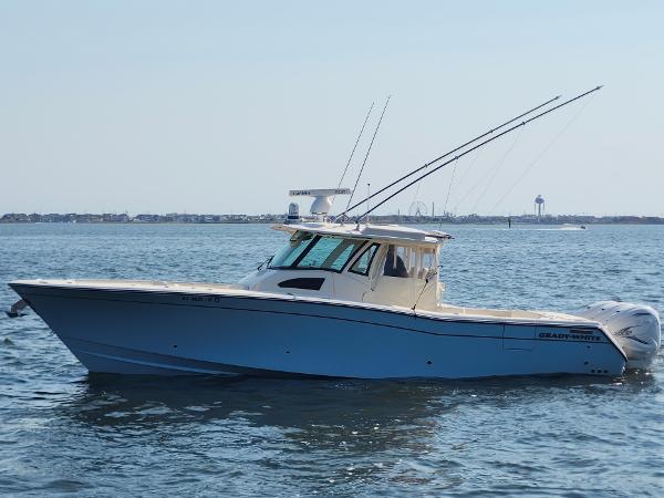 Grady-White Canyon 376 2023 Grady-White Canyon 376 boat on open water, side view.