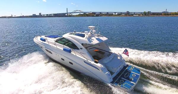 Sea Ray 470 Sundancer 2011 Sea Ray 470 Sundancer cruising on open water, rear view.