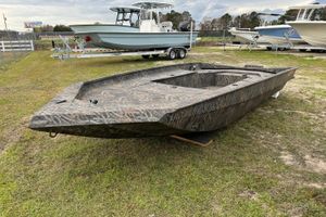 Alweld 1756 VV Invader 2026 1756 VV Invader boat with camouflage design on grassy area.