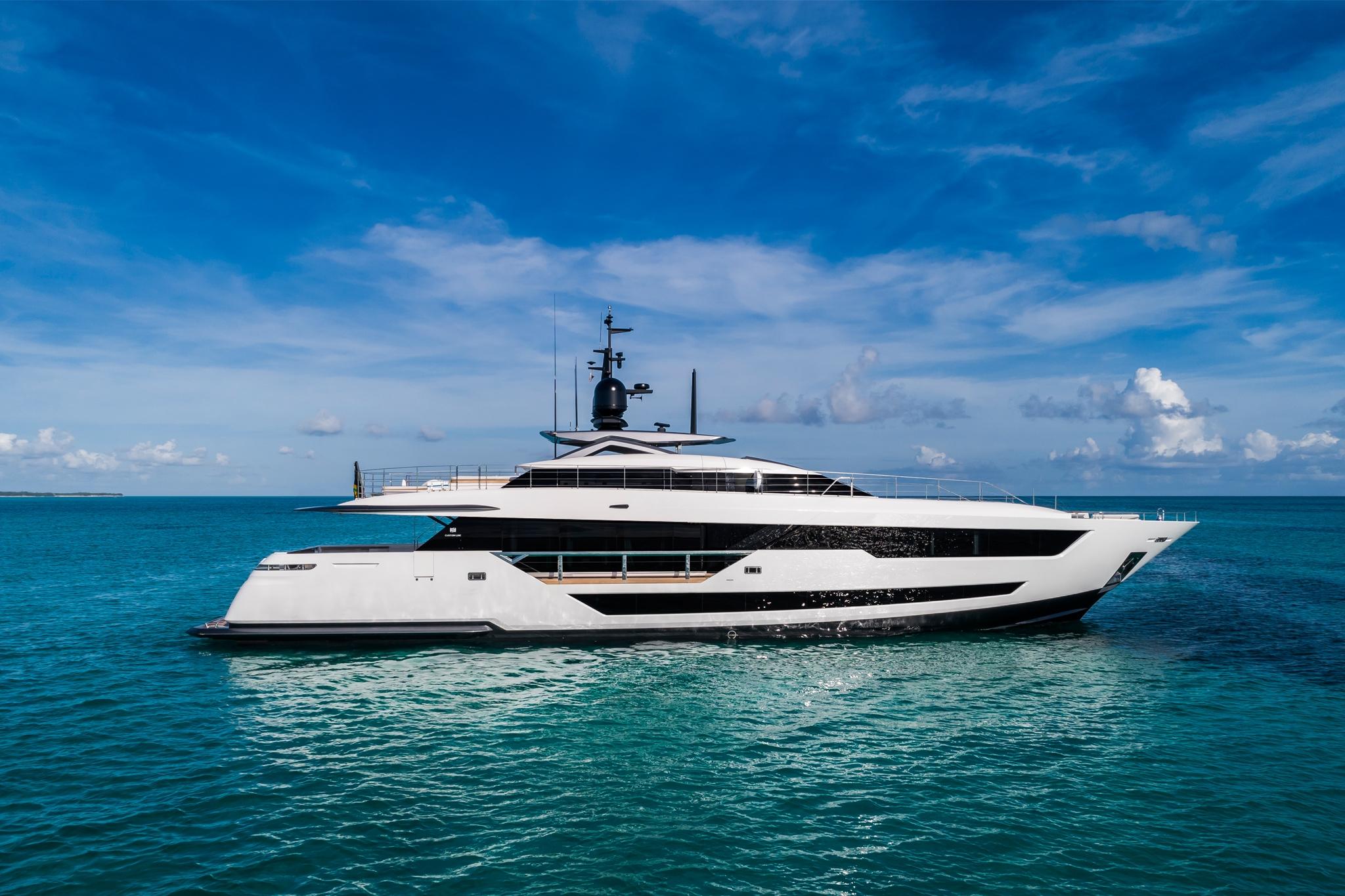 Custom Line 120' Luxury Custom Line 120' yacht 2026 at sunset with underwater lights.