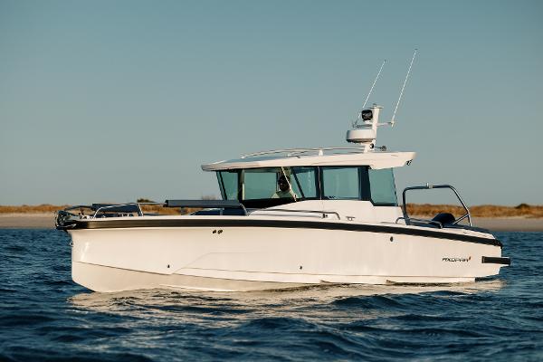 Axopar AX29 XC Cross Cabin U-Sofa 2025 Axopar AX29 XC Cross Cabin U-Sofa boat on calm water.