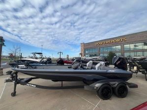 Nitro Z21 XL Pro 2025 Nitro Z21 XL Pro boat displayed at Powersports dealership under a cloudy sky.