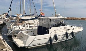 Faeton 980 OPEN MORAGA 2009 Faeton 980 OPEN MORAGA boat docked in marina with fenders and flags.