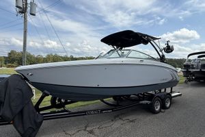 Cobalt R5 Surf 2020 Cobalt R5 Surf boat on trailer, parked outdoors under a partly cloudy sky.