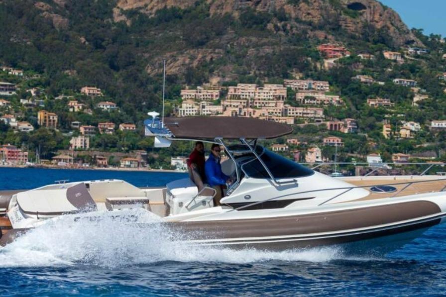 Nuova Jolly Prince 38 Sport Cabin 2019 Nuova Jolly Prince 38 Sport Cabin cruising near scenic coastal town.