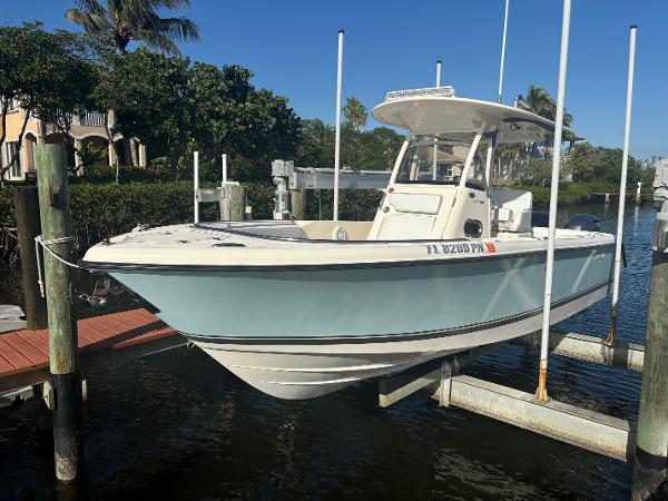 Pursuit C 260 Center Console 2014 Pursuit C 260 Center Console boat docked in a marina.