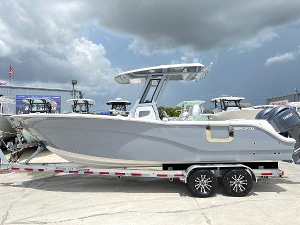 Sea Fox 268 Commander 2025 Sea Fox 268 Commander boat on a trailer under cloudy skies.