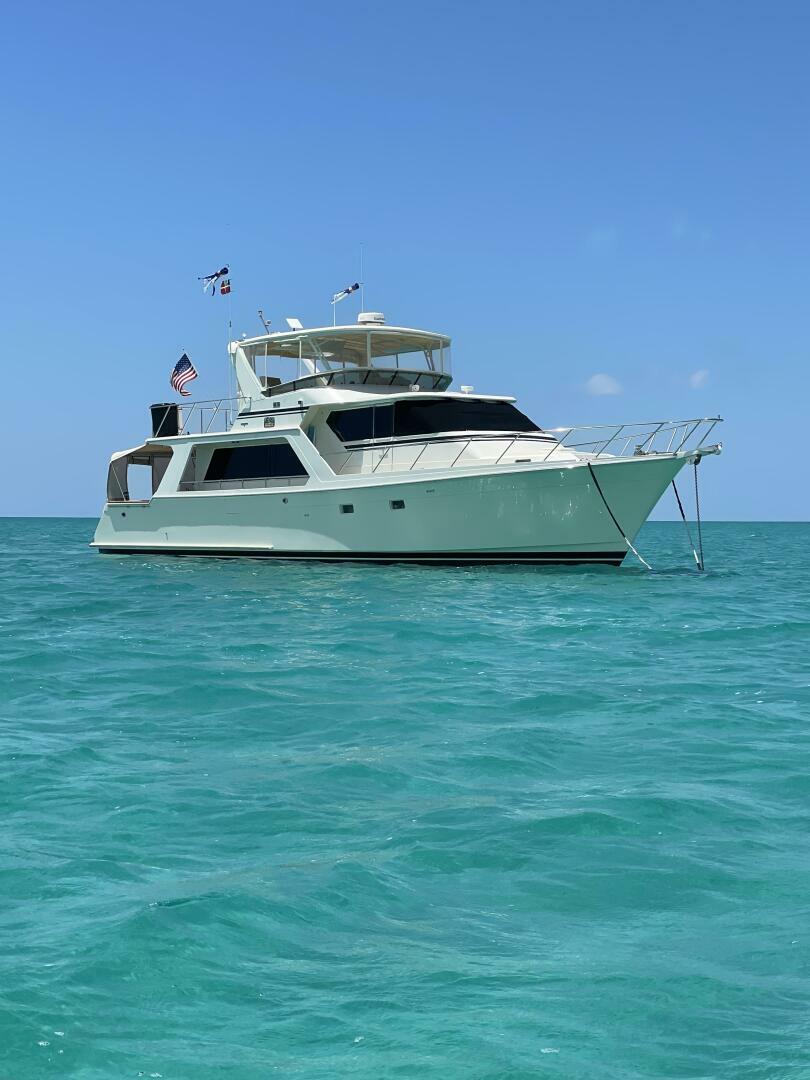 Offshore Yachts 54 Pilothouse 2004 Offshore Yachts 54 Pilothouse cruising on clear blue ocean waters.