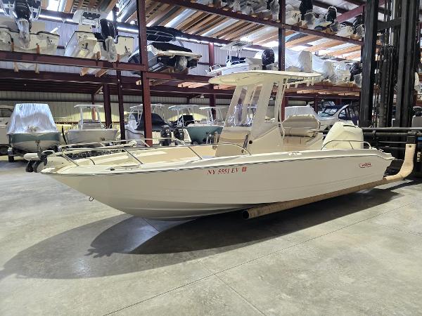 Boston Whaler 220 Dauntless 2022 Boston Whaler 220 Dauntless boat in indoor storage facility.