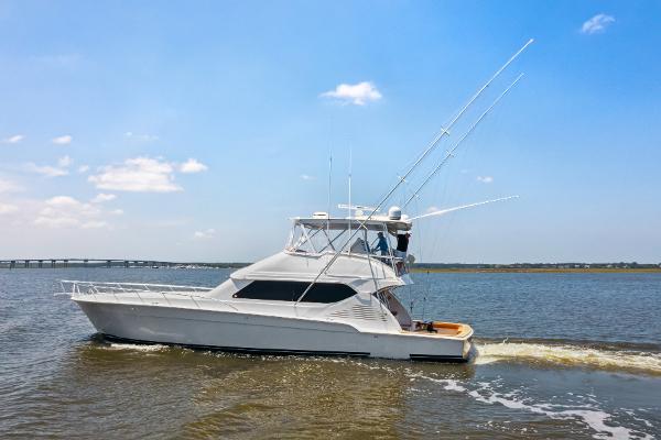 Bertram Custom Sportfish 2012 Bertram Custom Sportfish yacht cruising on a sunny day.
