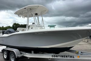 Tidewater 210 CC Adventure 2014 Tidewater 210 CC Adventure boat on trailer under cloudy sky.