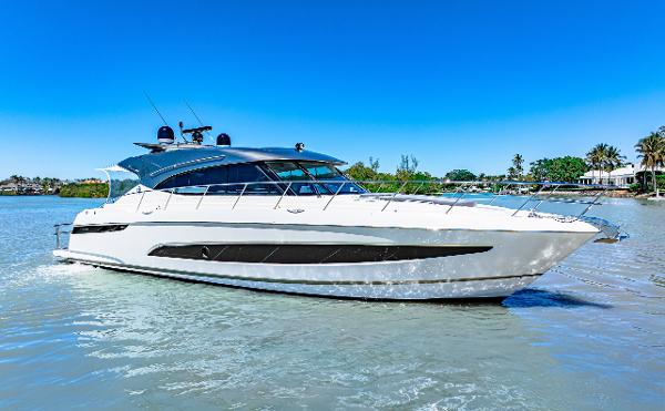 Riviera 5400 Sport Yacht 2022 Riviera 5400 Sport Yacht cruising on a sunny day, showcasing sleek design and luxury.