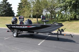 Tracker Pro Team 175 Crappie Edition 2026 Tracker Pro Team 175 Crappie Edition boat on trailer, parked outdoors.