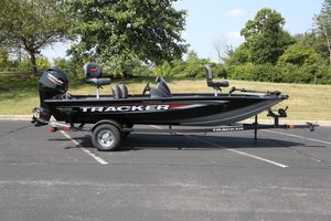 Tracker Pro Team 175 Crappie Edition 2026 Tracker Pro Team 175 Crappie Edition boat on trailer, parked outdoors.