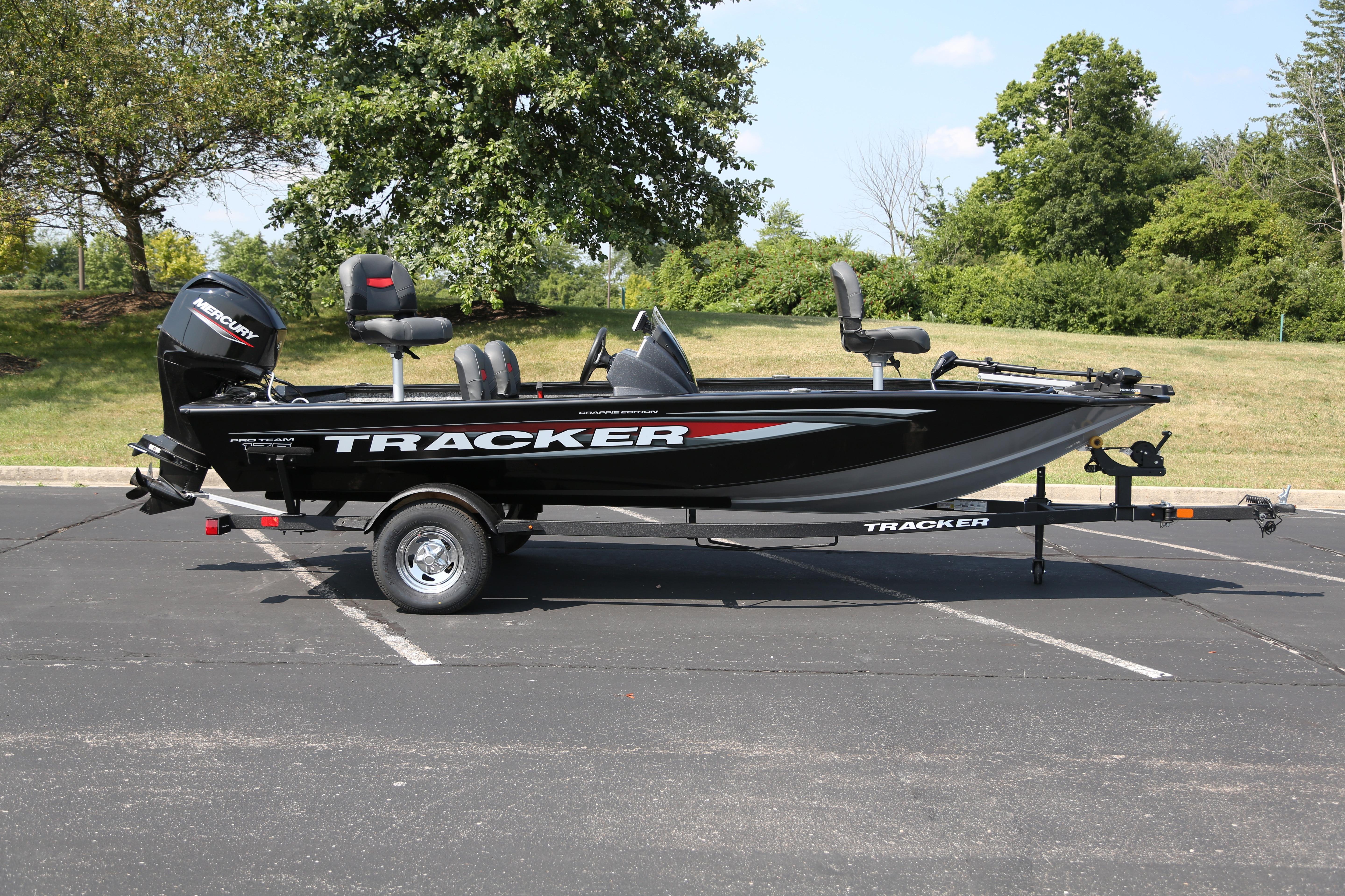 Tracker Pro Team 175 Crappie Edition 2026 Tracker Pro Team 175 Crappie Edition boat on trailer, parked outdoors.