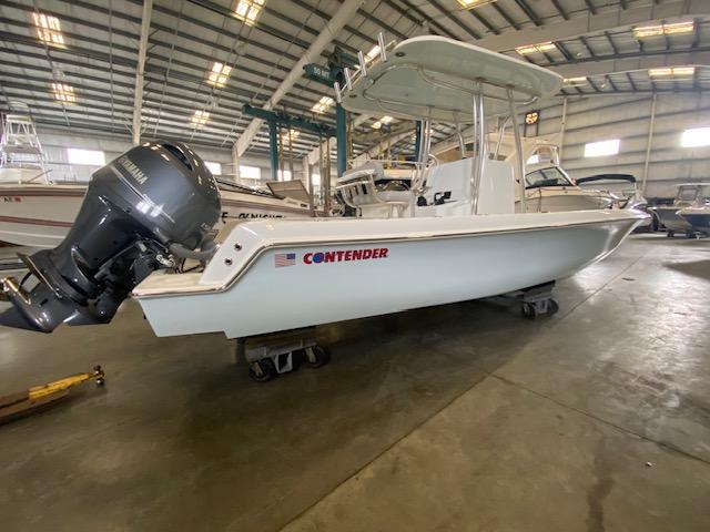 Contender 24 Sportfish 2024 Contender 24 Sportfish boat in indoor storage facility.