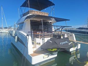 Fountaine Pajot MY 37 2015 Fountaine Pajot MY 37 yacht docked with jet ski on the back.