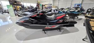 Kawasaki Jetski Ultra 160 LX-S 2025 Kawasaki Jetski Ultra 160 LX-S displayed in showroom, sleek black and red design.