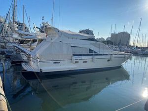 Guy Couach 1501 1993 Guy Couach 1501 yacht docked in a marina under clear blue skies.