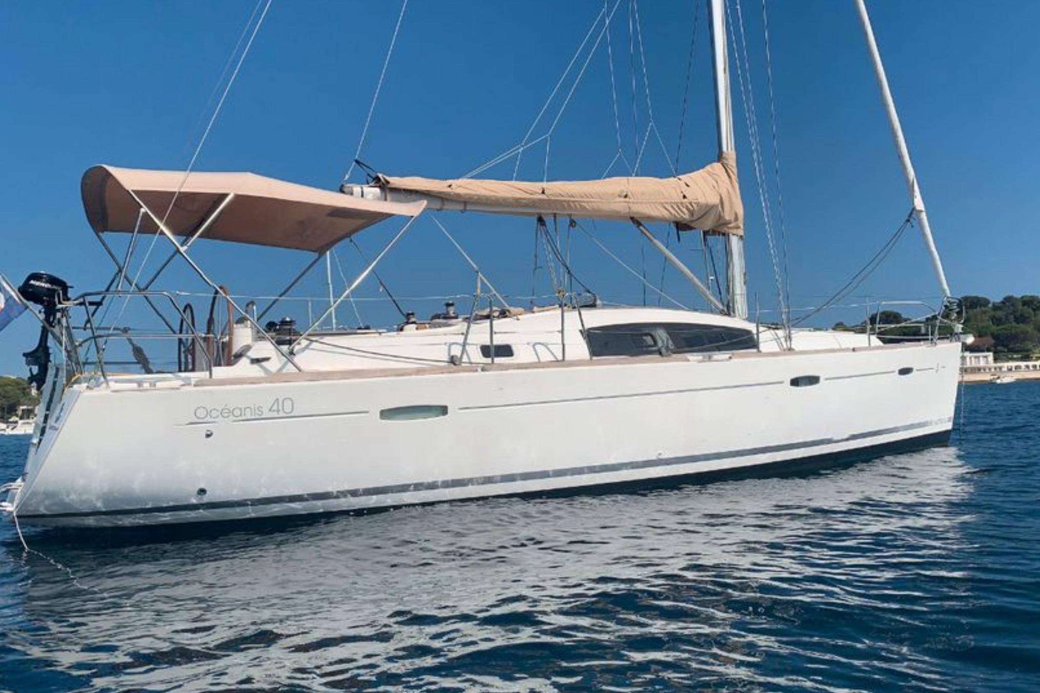 Beneteau Oceanis 40 2007 Beneteau Oceanis 40 sailboat on calm blue water under clear sky.