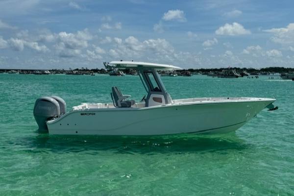 Sea Fox 268 Commander 2025 Sea Fox 268 Commander boat on clear turquoise water under a blue sky.