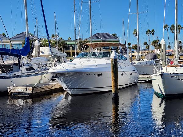 Cruisers Yachts 3375 Esprit 1999 Cruisers Yachts 3375 Esprit docked in a marina with sailboats.