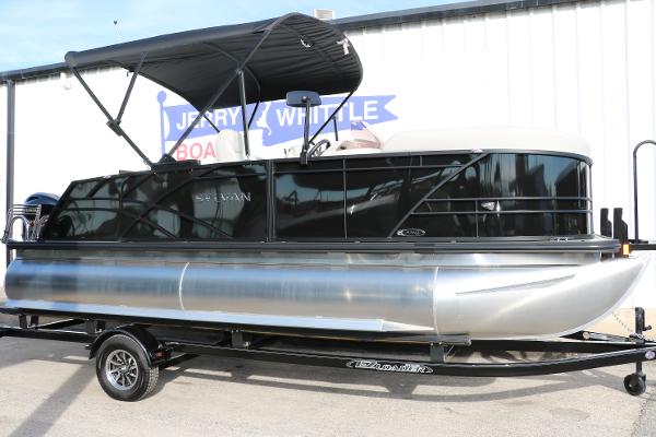 Sylvan 820 CLZ DH Premium Pontoon 2025 Sylvan 820 CLZ DH Premium Pontoon with black canopy on trailer.