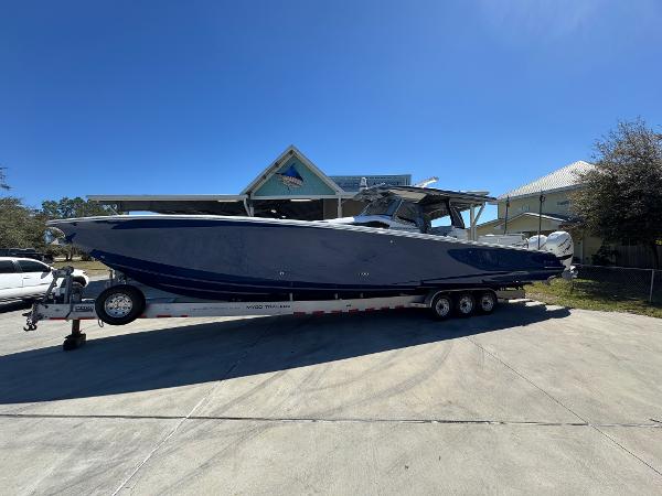 Nor-Tech 452 Super Fish 2018 Nor-Tech 452 Super Fish boat on trailer, parked outdoors under clear blue sky.