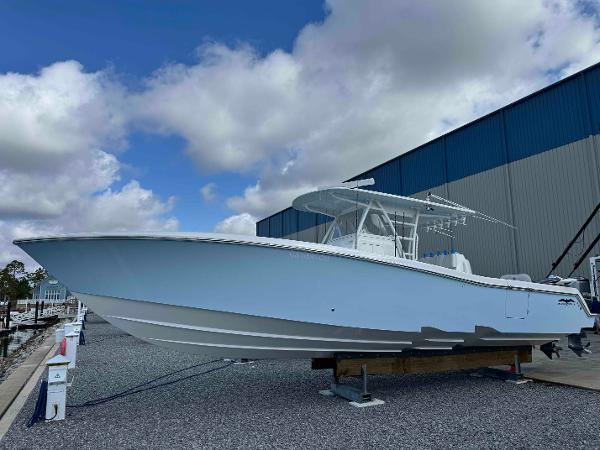 Invincible 39' Open Fisherman 2016 Invincible 39' Open Fisherman boat on display under cloudy sky.