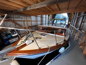 Chris-Craft Constellation 31 1963 Chris-Craft Constellation 31 boat docked in a wooden boathouse.