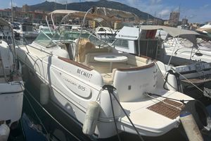 Jeanneau Leader 805 2005 Jeanneau Leader 805 boat docked in a marina, surrounded by other vessels.