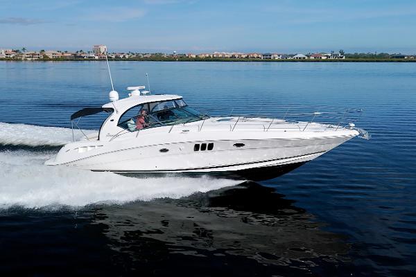 Sea Ray 44 Sundancer 2009 Sea Ray 44 Sundancer cruising on calm water.