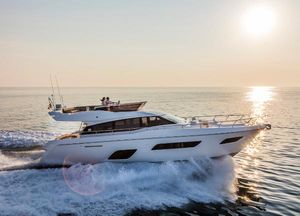 Ferretti Yachts 550 2019 Ferretti Yachts 550 cruising at sunset on open water.