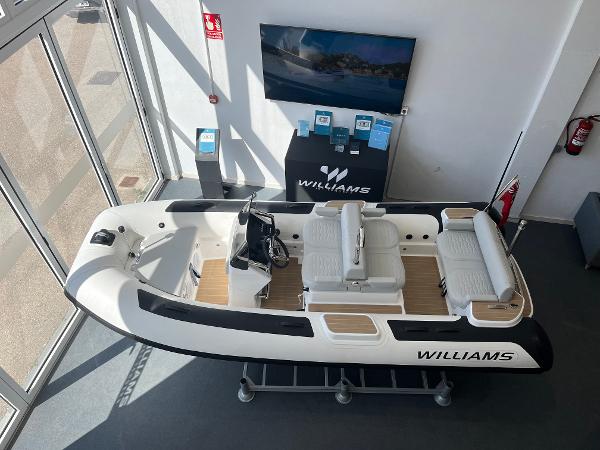 Williams Jet Tenders Dieseljet 445 2023 Williams Jet Tenders Dieseljet 445 on display in showroom, featuring sleek design and modern amenities.