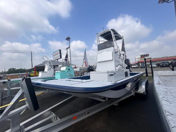 Shallow Stalker CAT211PRO 2025 Shallow Stalker CAT211PRO boat on trailer under cloudy sky.