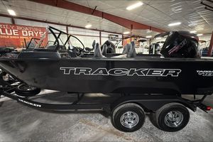 Tracker Targa V-18 WT 2026 Tracker Targa V-18 WT boat displayed indoors on a trailer.