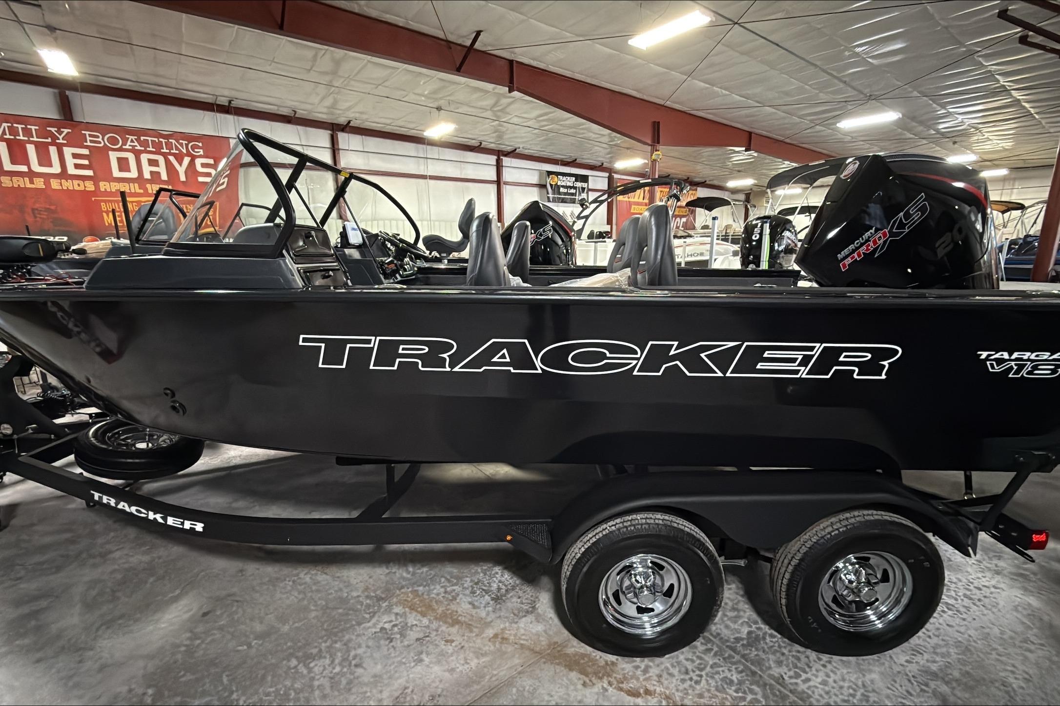 Tracker Targa V-18 WT 2026 Tracker Targa V-18 WT boat displayed indoors on a trailer.